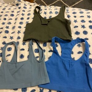 Three tank tops